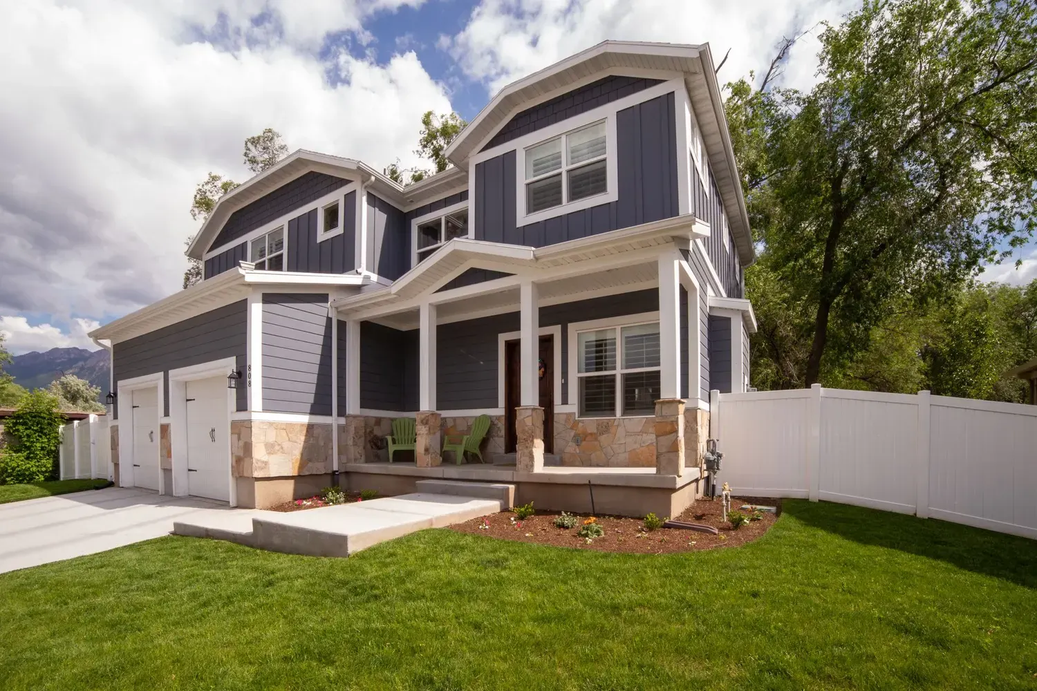 Freshly painted two-story home exterior with garage in Marietta, GA